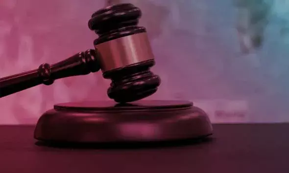 കട്ടിലില്‍ ഉറങ്ങി കിടക്കുകയായിരുന്ന യുവതിയെ മാനഭംഗപെടുത്തിയ കേസില്‍ പ്രതിയായ യുവാവിന് 2 വര്‍ഷം തടവും 10,000 രൂപ പിഴയും
