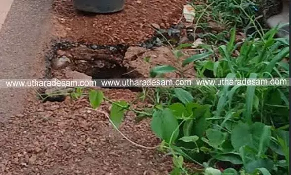സീതാംഗോളി ഓവുചാലില്‍ മാലിന്യങ്ങള്‍ നിറഞ്ഞു; മഴവെള്ളം റോഡിലേക്കൊഴുകി കുഴി പ്രത്യക്ഷപ്പെട്ടു