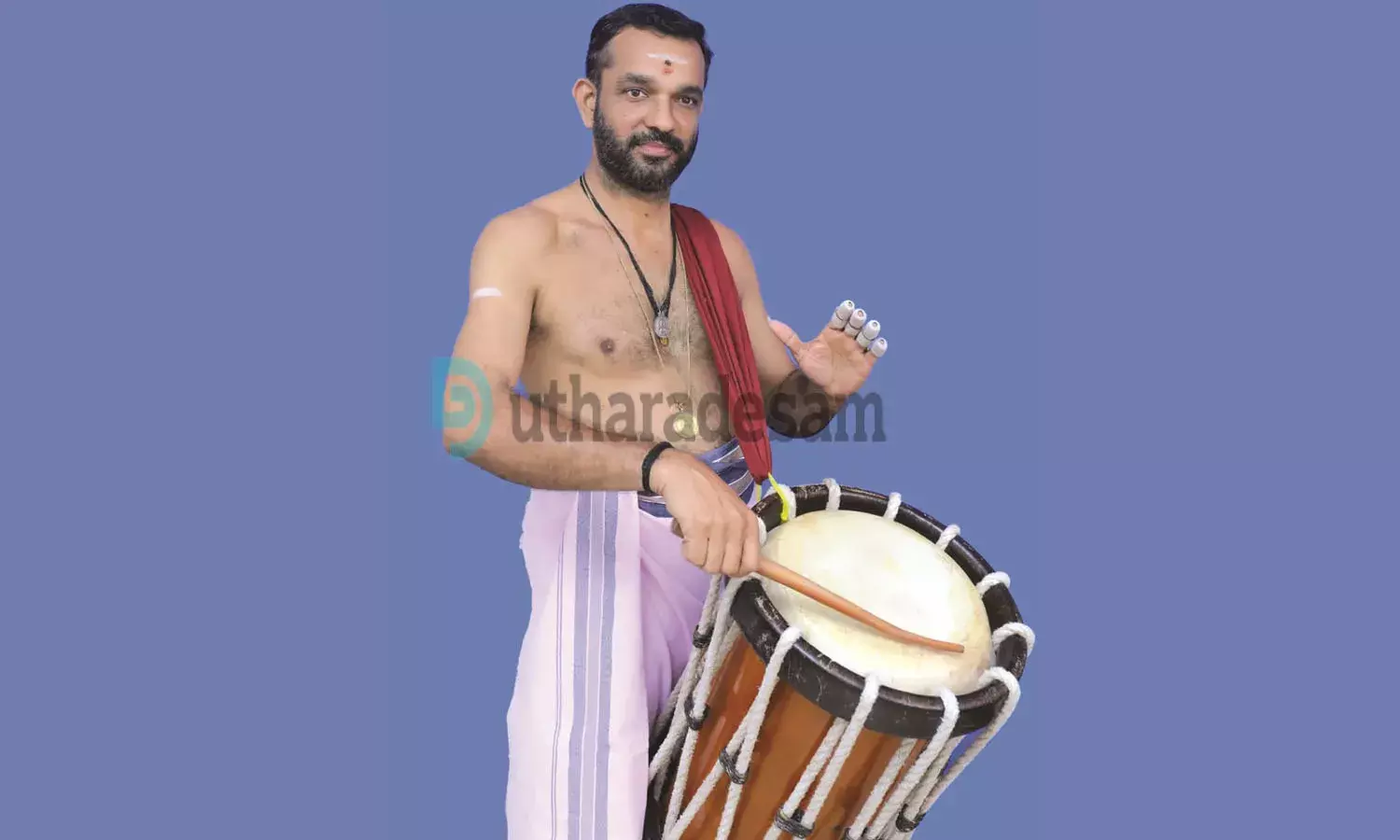 നീലേശ്വരം സന്തോഷ് മാരാര്‍ക്ക്  വാദ്യകലയിലെ പരമോന്നത ബഹുമതി