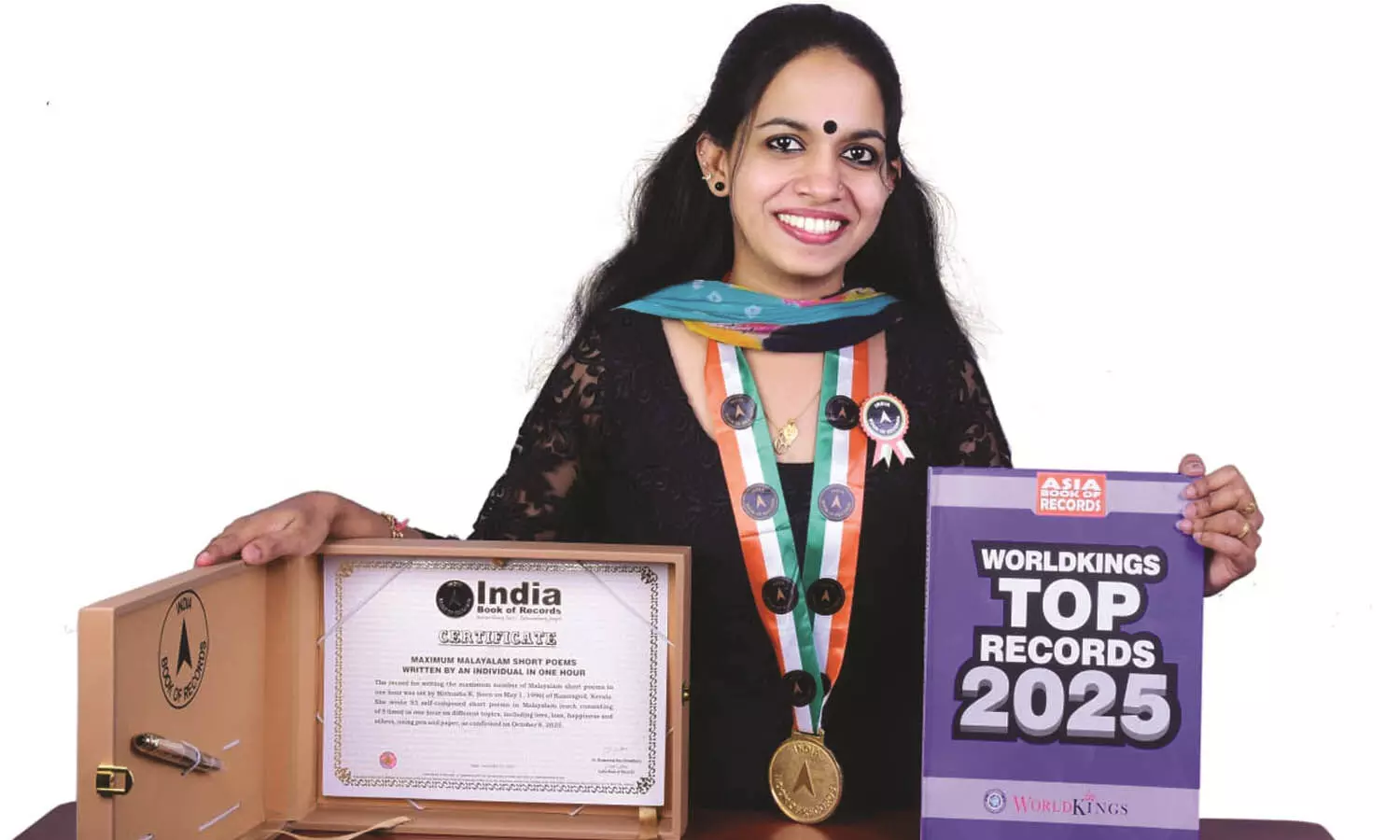 ഒരു മണിക്കൂറിനുള്ളില്‍ 93 ചെറുകവിത; ഇന്ത്യാ ബുക്ക് ഓഫ് റോക്കോര്‍ഡില്‍  ഇടം നേടി മിഥുഷ മുകേഷ്