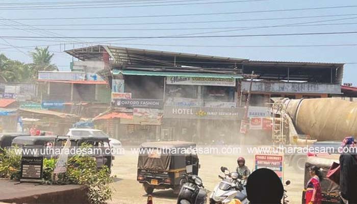 കെ.എസ്.ടി.പി റോഡ് നിര്‍മ്മാണം: പുകപടലത്താല്‍ മൂടപ്പെട്ട് കുമ്പള ടൗണ്‍; വ്യാപാരികള്‍ക്ക് ദുരിതം