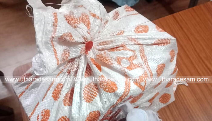 സ്‌കൂട്ടറില്‍ കടത്തിയ മദ്യം പിടിക്കുന്നതിനിടെ എക്‌സൈസ് സംഘത്തെ കത്തികാട്ടി ഭീഷണിപ്പെടുത്തി പ്രതി രക്ഷപ്പെട്ടു
