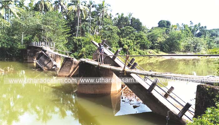 നടപ്പാലം തകര്‍ന്ന് വീണ് വീട്ടമ്മക്ക് പരിക്ക്